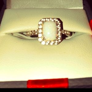 Opal and white sapphire sterling silver ring set in an antique setting size 7
